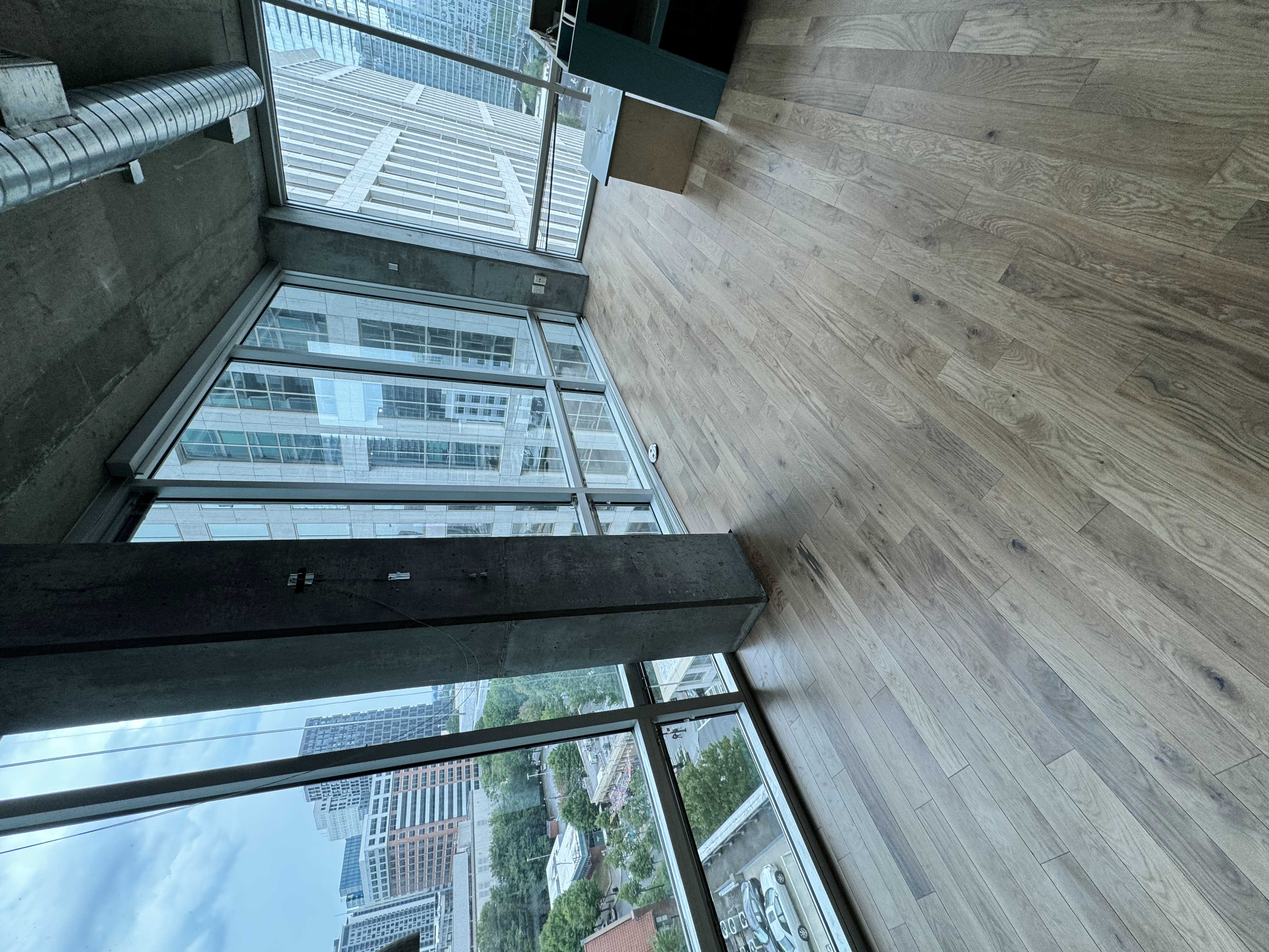 Wide-plank hardwood flooring in luxury Connecticut high-rise